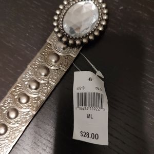 Plated metal belt with stretchy backing New M/L very pretty stone at the buckle